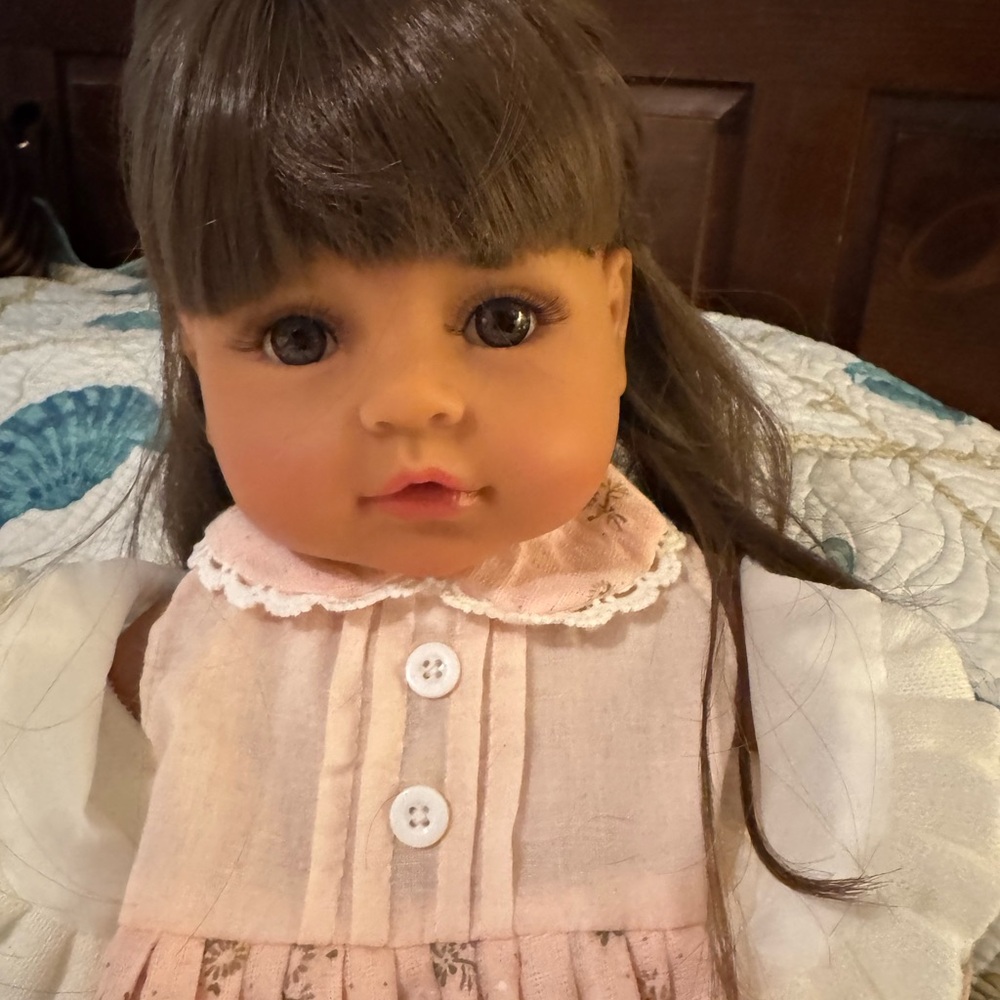 Adorable Brown-Haired Baby Doll
